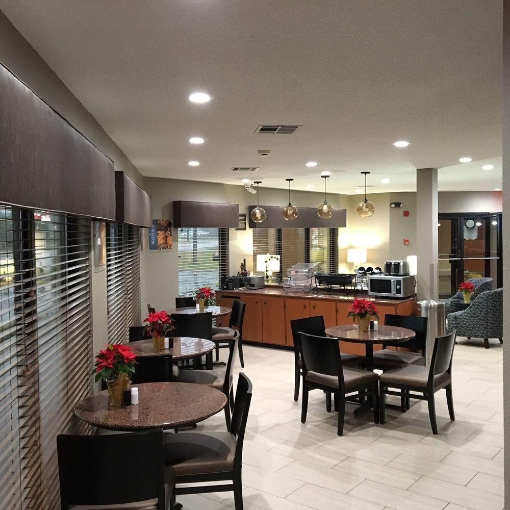 Best Western Airport Inn Пърл Екстериор снимка