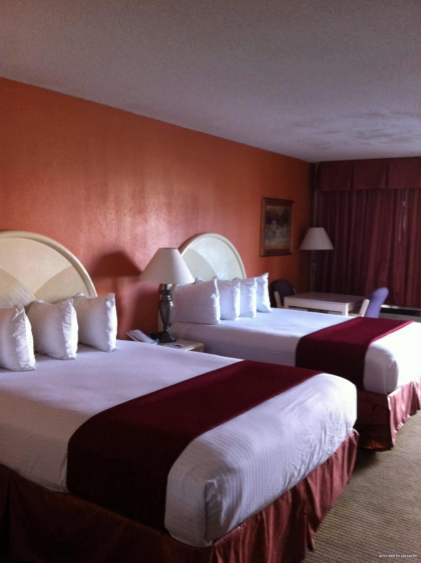 Best Western Airport Inn Пърл Екстериор снимка
