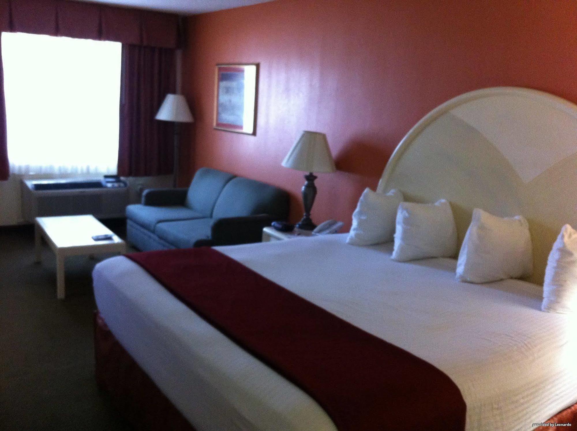 Best Western Airport Inn Пърл Екстериор снимка